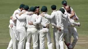 Australia's Steve O'Keefe, center, and teammates celebrate after winning the first cricket test match against India in Pune, India, Saturday, Feb. 25, 2017. (AP Photo/Rajanish Kakade)
